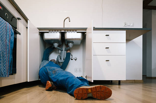 Professional Drain Cleaning technician working in East Providence, RI